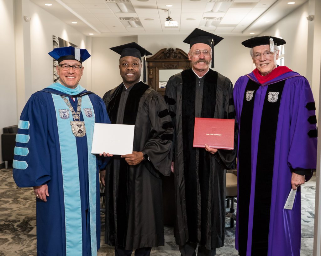 BJU President Steve Pettit and Chancellor Bob Jones III with honorary doctoral recipients, Senator Tim Scott and Jonathan Edwards, Greenville, SC, May 4, 2018. (Hal Cook)