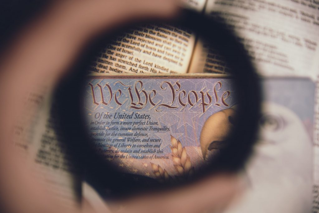 Constitution and Bible through a magnifying glass