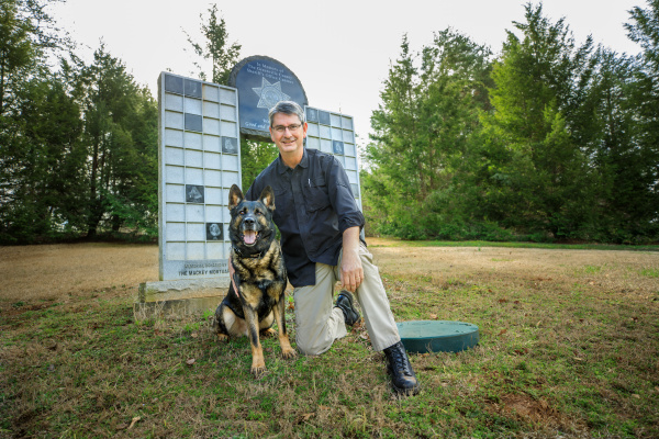 John Gardner with his dog Diesel at the Greenville County Sheriff's Office Canine Memorial
