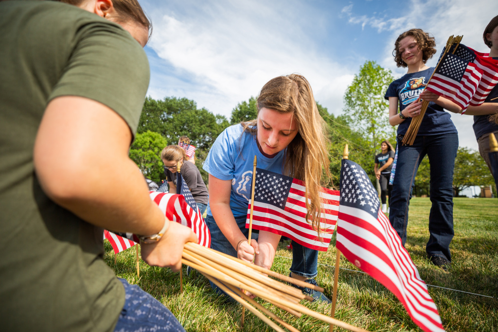 Students plant flags in memorial of victims of 9/11
