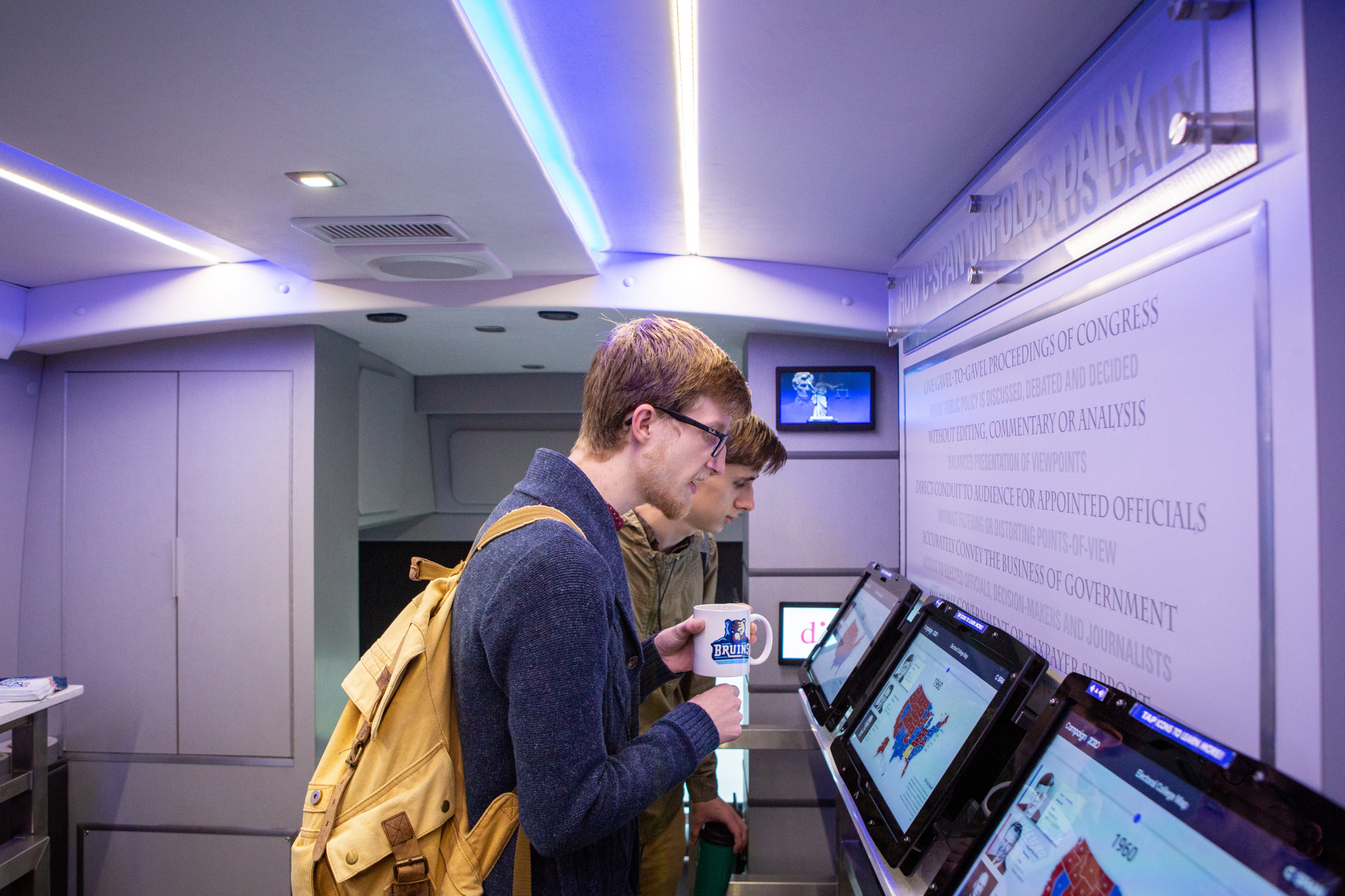 Students interact with the displays on the C-SPAN bus (Photo by Chad Ratje)
