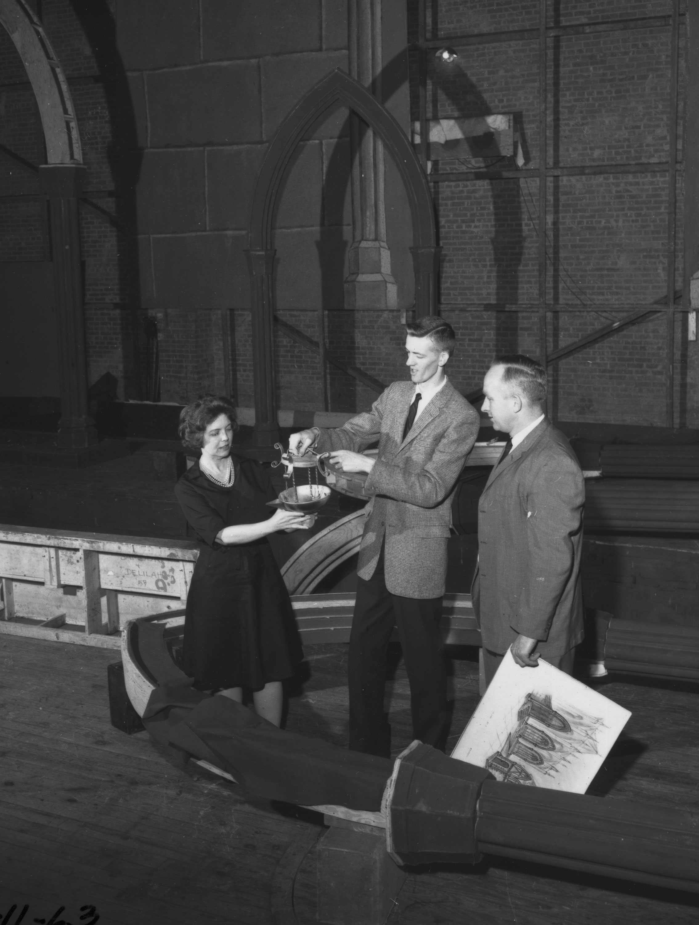 Photo of Eva Carrier, Dwight Gustafson and Mel Stratton on Rodeheaver stage, c. 1960