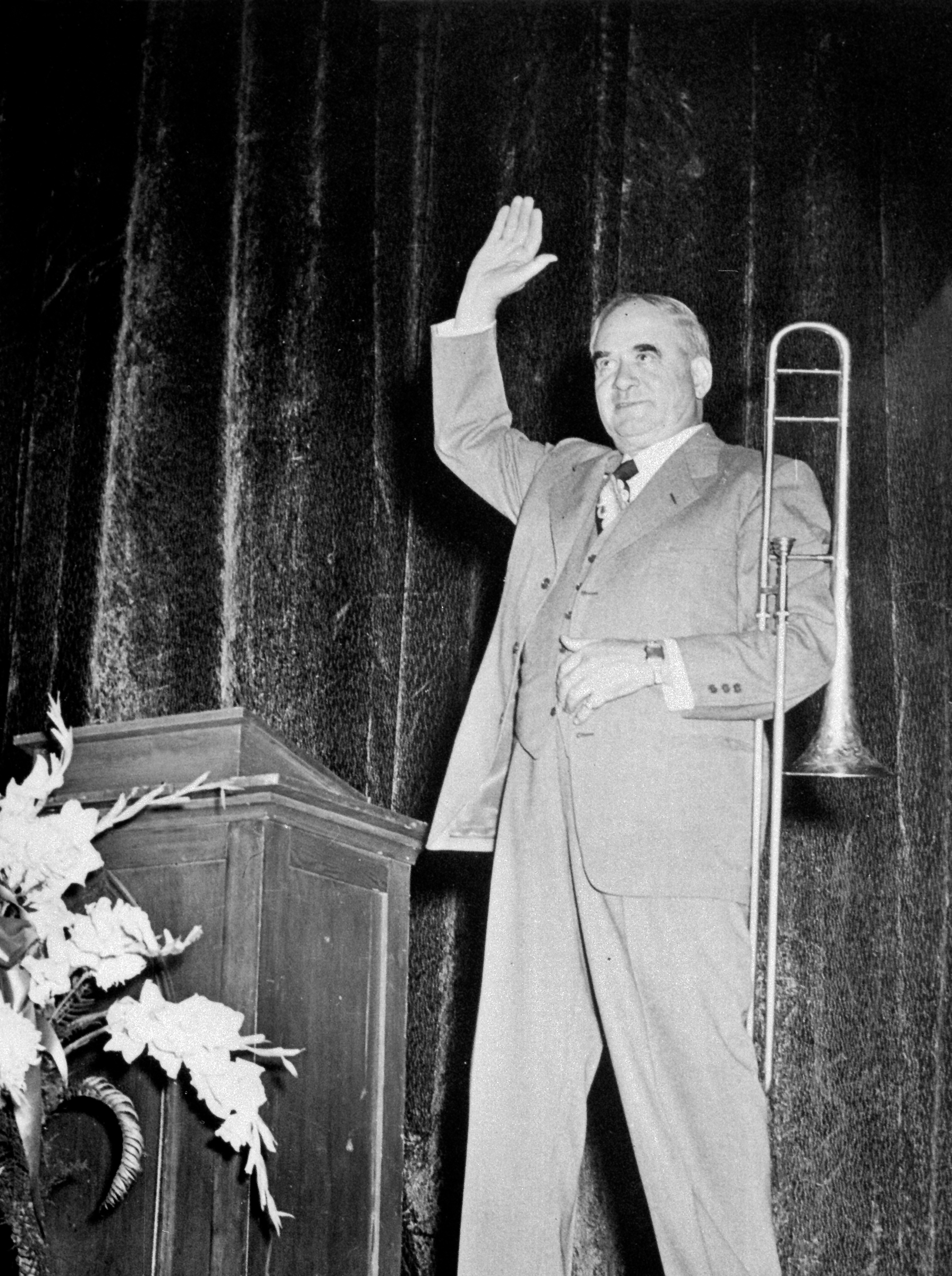 Homer Rodeheaver leads music with his trombone in Rodeheaver Auditorium at the 1951 Bible Conference
