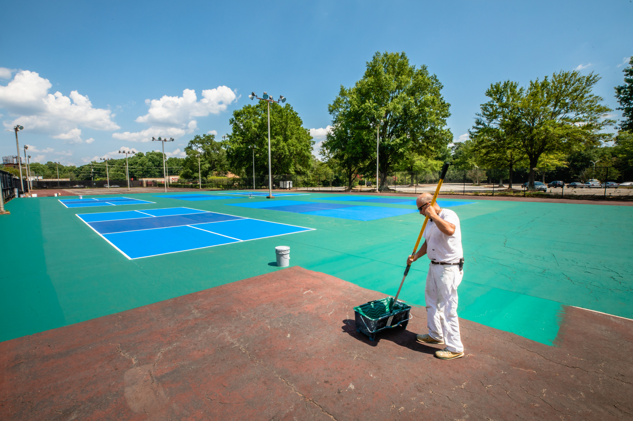The old tennis courts are refurbished to become pickle ball courts