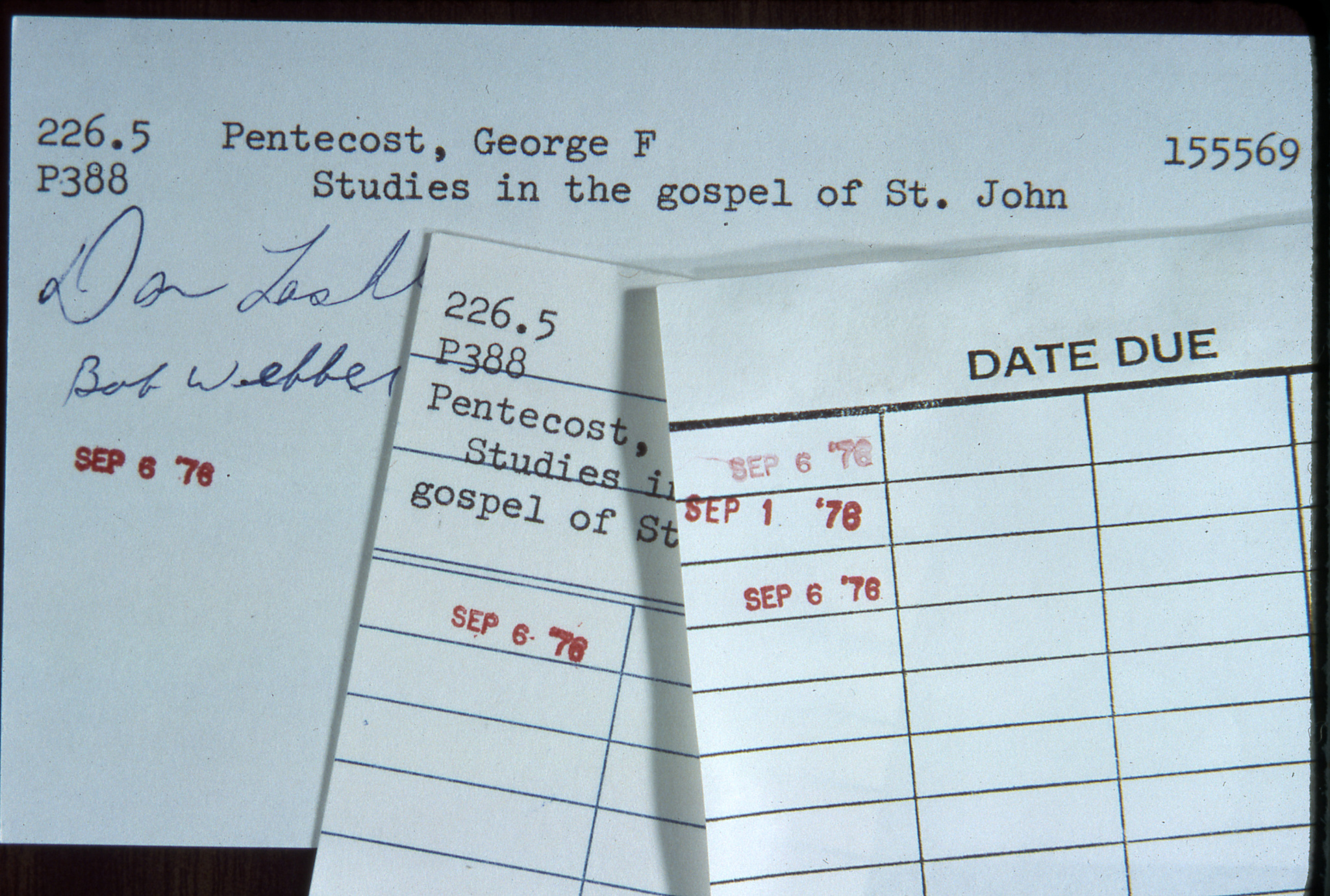 Photo of author, date due and date slip cards, 1976