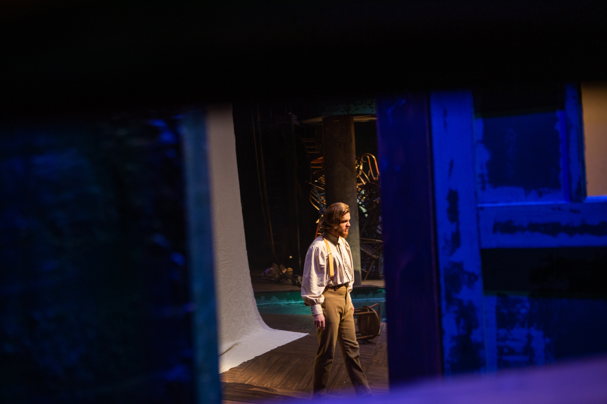 Shot of John Michael Cox as Prospero in The Tempest from behind the scenes