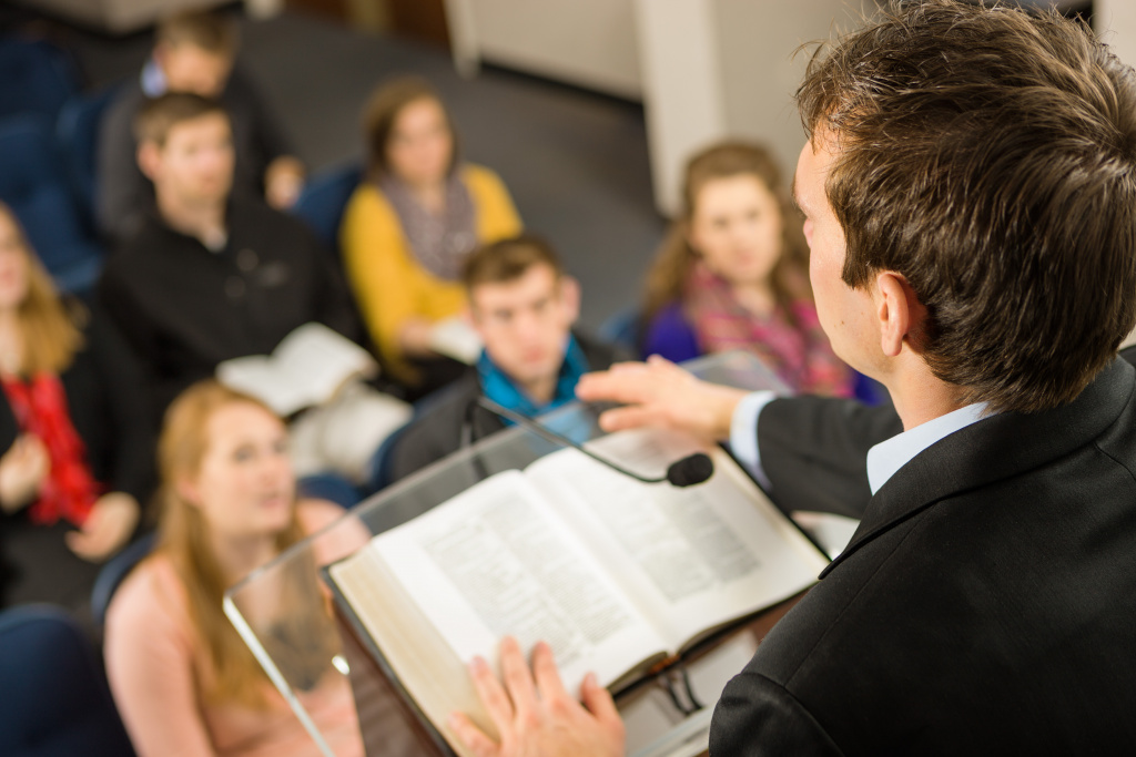 Biblical studies student preaching