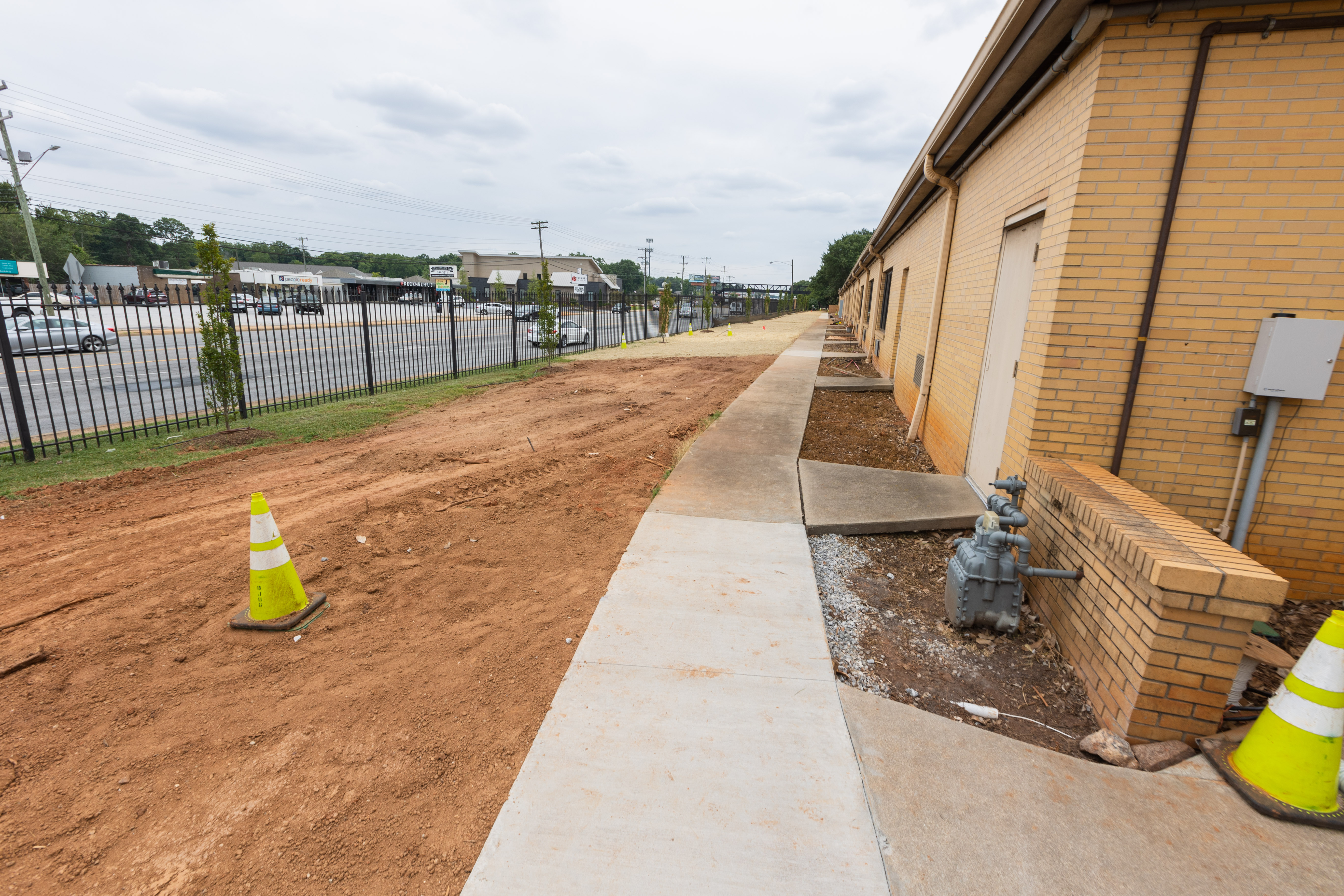 A sidewalk and greenspace is created on the back of the Pennington Child Development Center