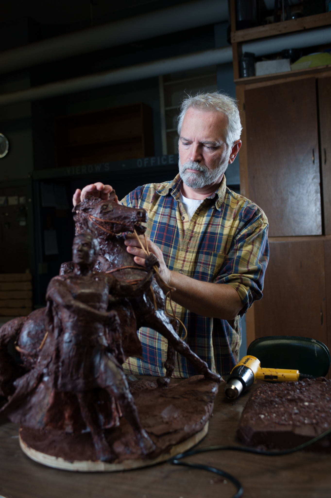 Doug Young works on a sculpture for the 2015 Living Gallery production