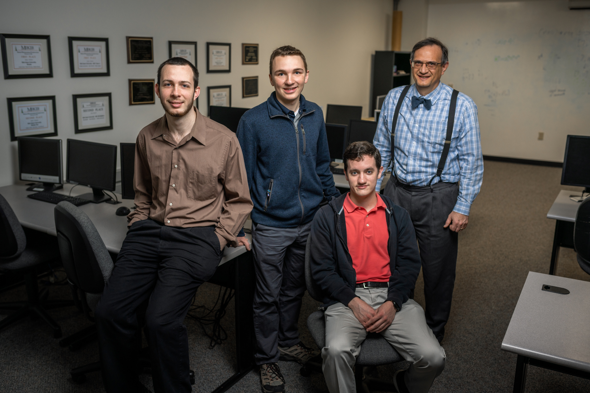 Programming Team of Erick Ross, Steven Platt, Elias Watson and computer science department head Jim Knisely (Photo by Derek Eckenroth)