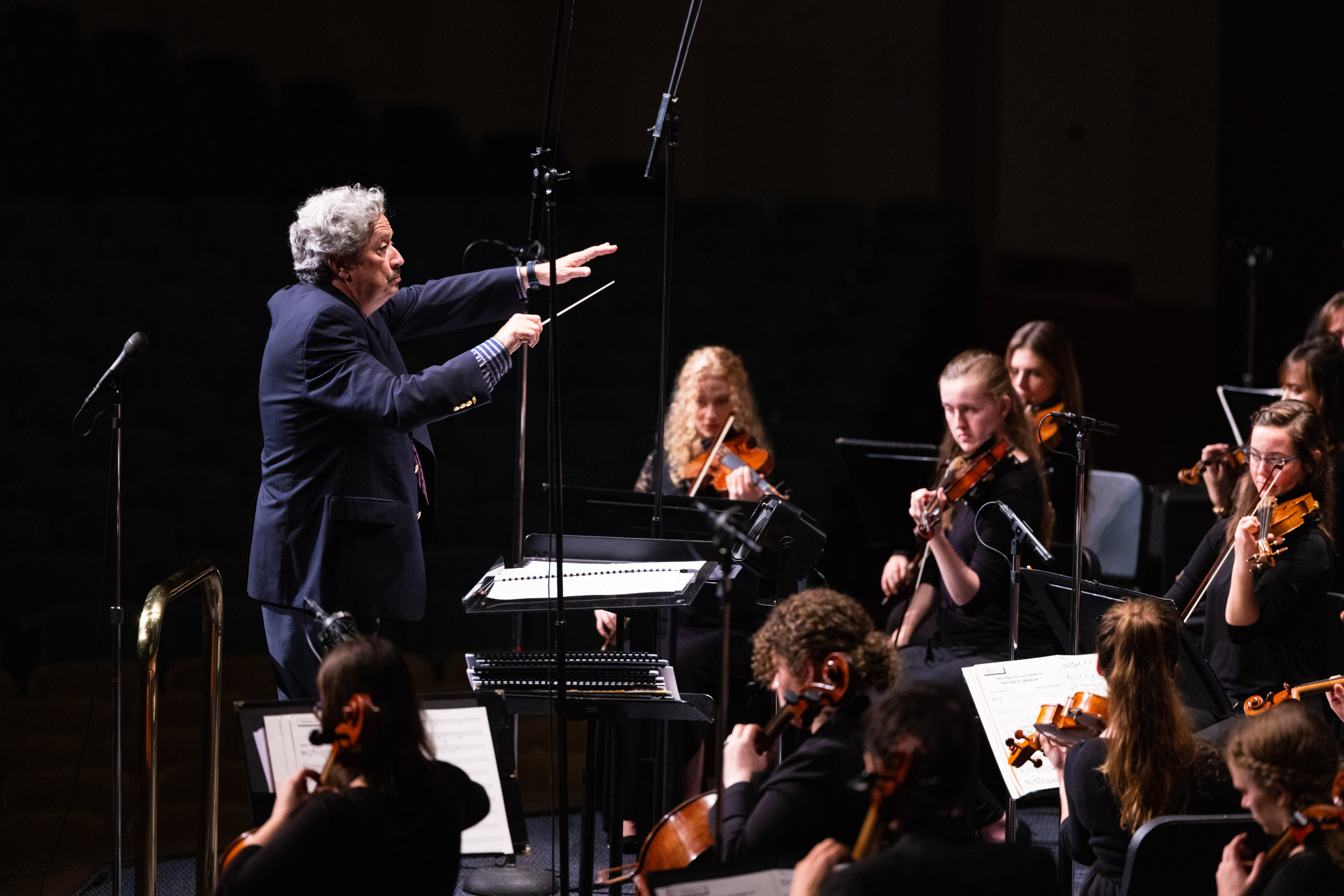 Lee Holdridge conducts the BJU Symphony Orchestra in Symphonic Hollywood (Photo by Derek Eckenroth)